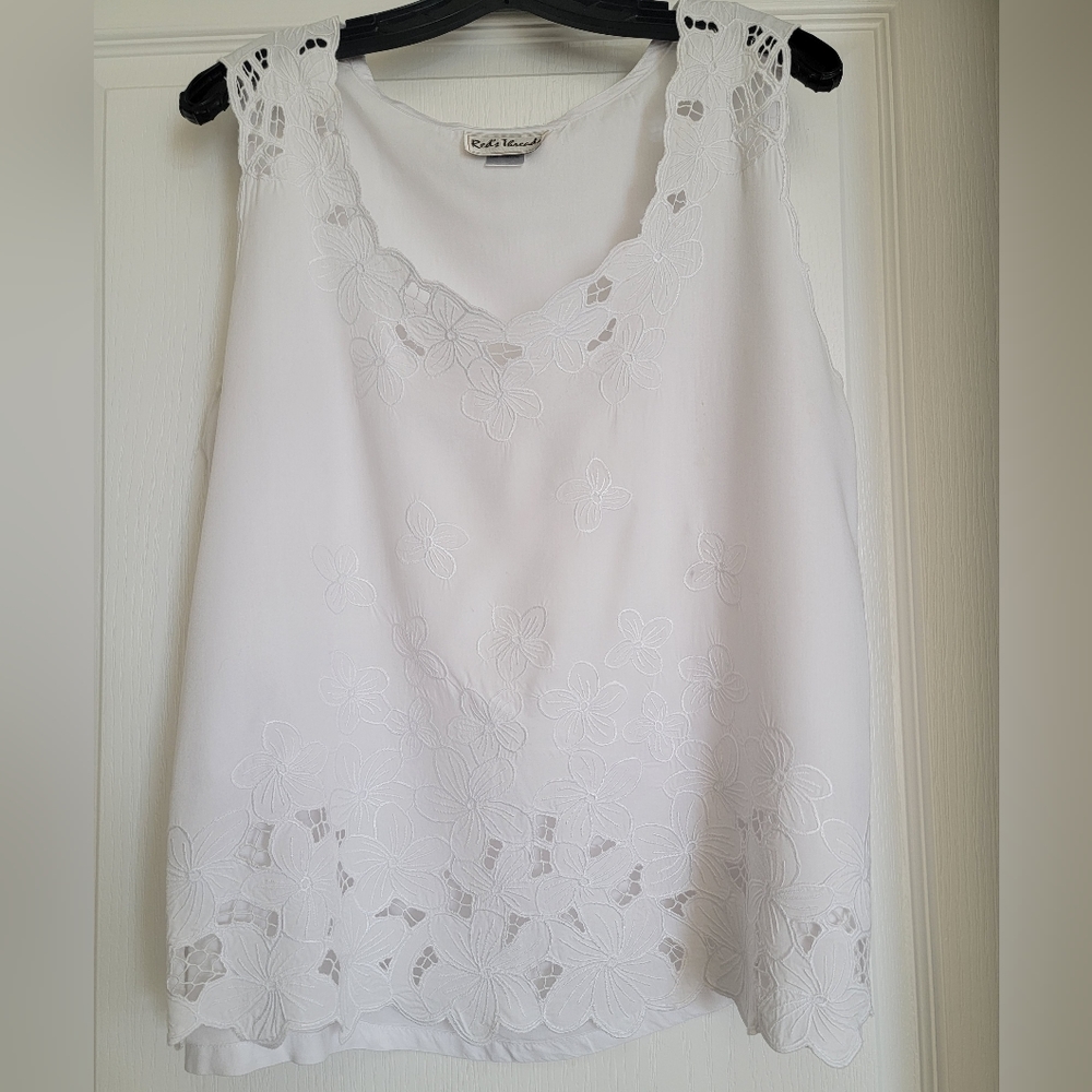 White soft rayon cutout lace summer top.